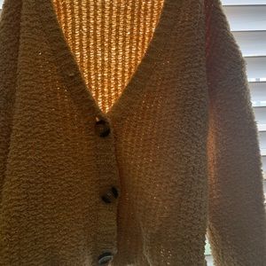 yellow button up sweater